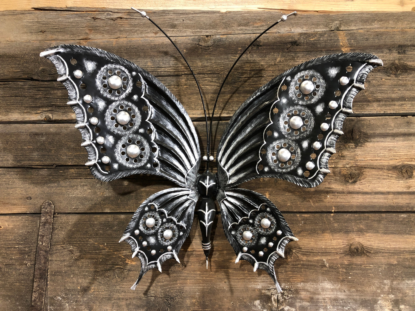 Butterfly chiseled in wrought iron